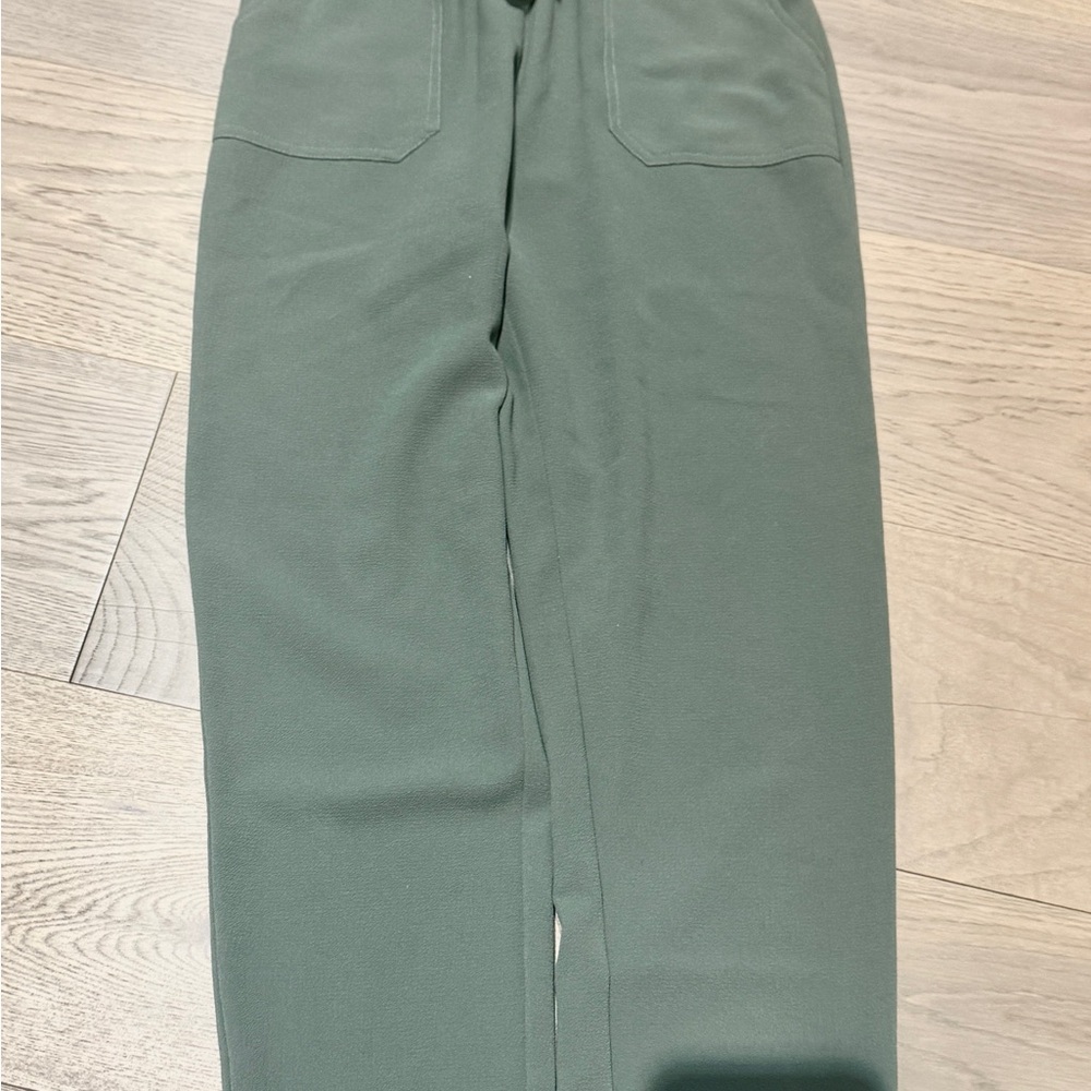Green Sleeveless Jumpsuit with Belt Detail